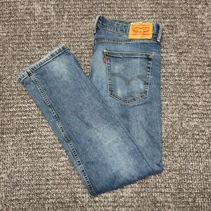 Levis Mens 519‎ Jeans Size 34x32 Medium Wash Blue Distressed Stretch